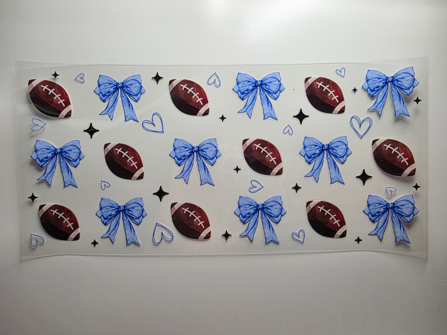 Footballs & Blue Bows